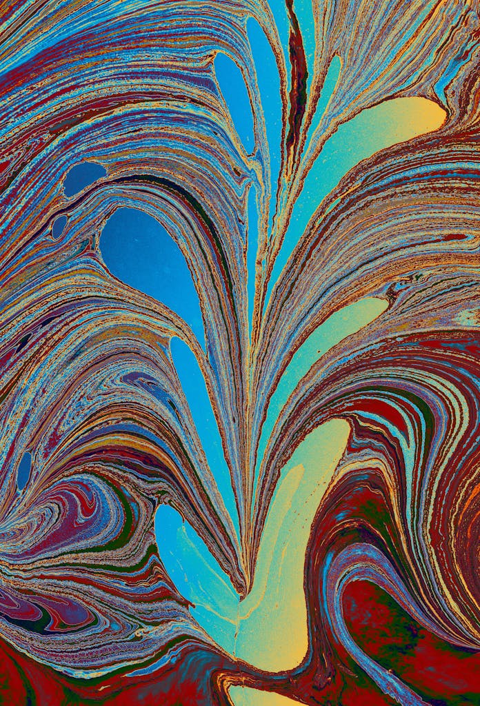 Vibrant abstract acrylic painting with swirling colors and dynamic texture.